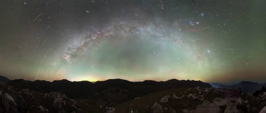 The 2026 Outer Planet Grand Trine diagram: Pluto in Aquarius, Uranus in Gemini, and Saturn-Neptune in Aries forming a harmonious astrological configuration.